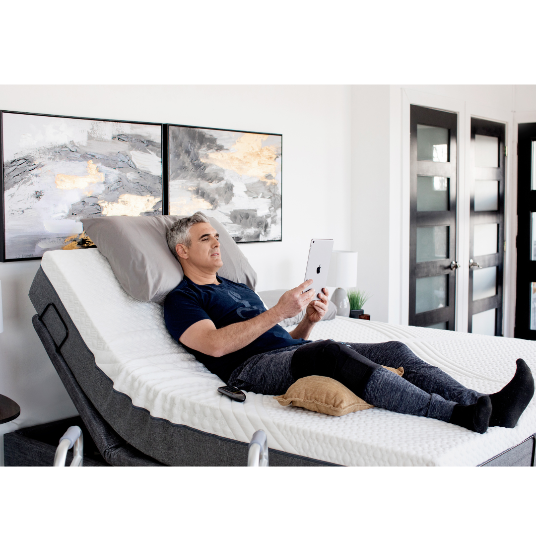 Golden Passport™ Hi Low Adjustable Bed with Dual-Zone Vibrating Massage - With user in reclined position
