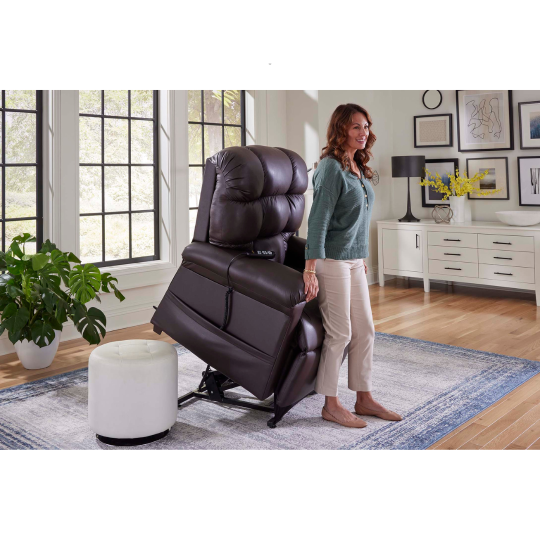 Golden Technologies PR510 MaxiComfort Cloud Series Extra Wide Assisted Lift Chair Recliner - with user in front of raised lift chair